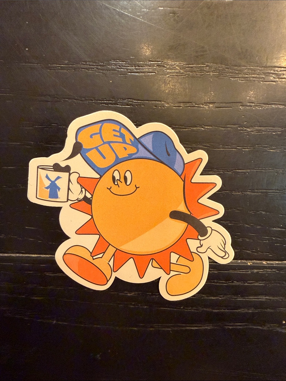 Dutch Bros Orange Sun Sticker with Blue Hat and Cup